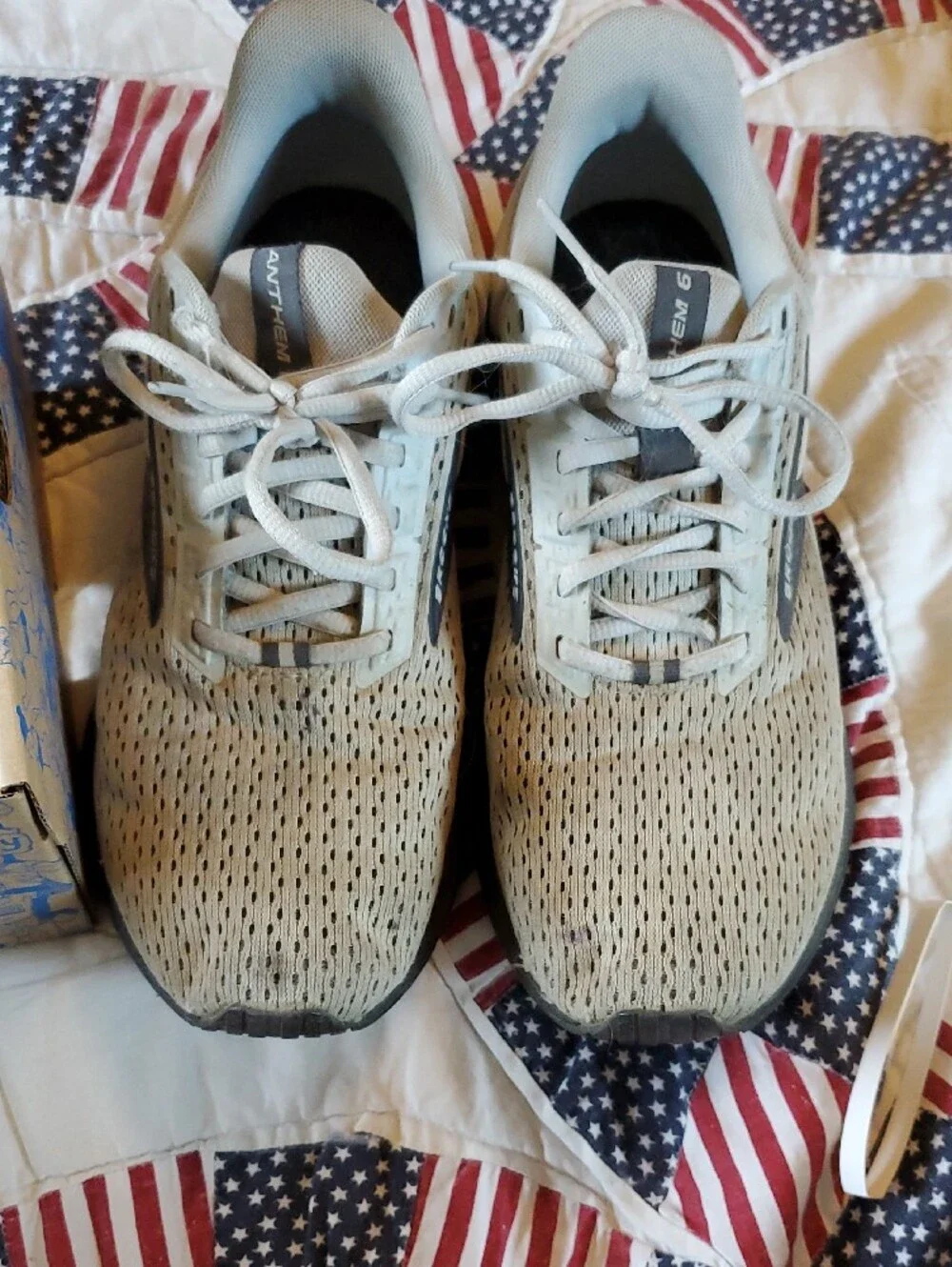 Brooks beige and white running shoes